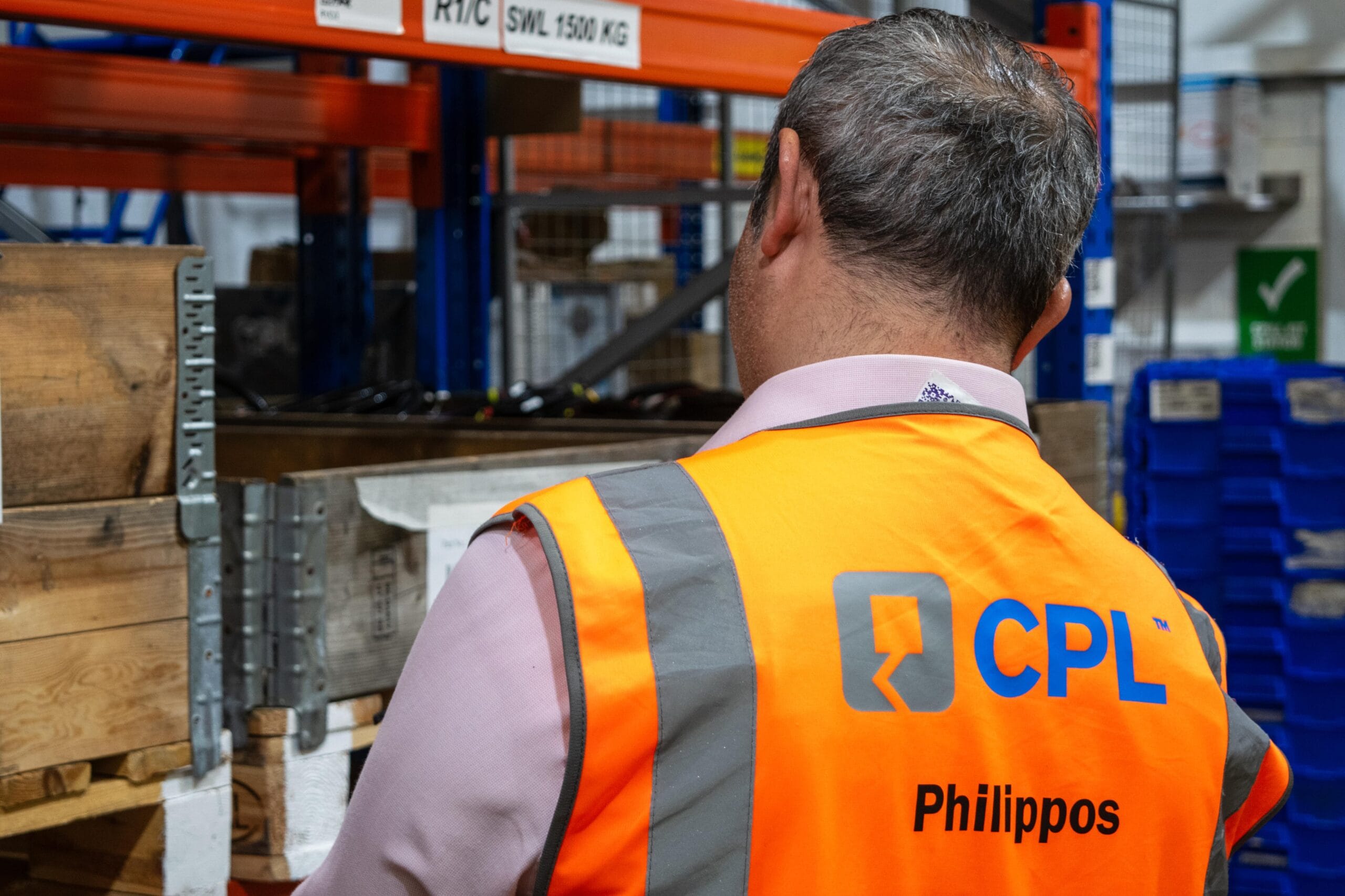 DSC_0006-min Worker in warehouse wearing CPL safety vest.